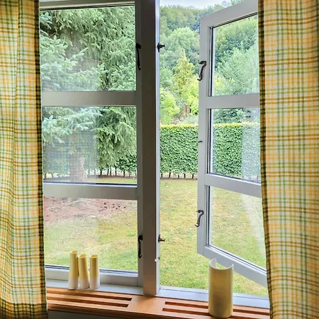 Black-painted Log House Overlooking Vejle Fjord Semesterbostad