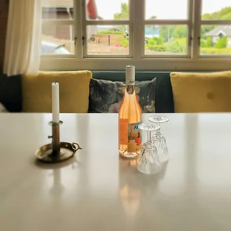 Black-painted Log House Overlooking Vejle Fjord Børkop