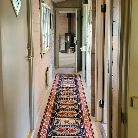 Semesterbostad Black-painted Log House Overlooking Vejle Fjord Børkop