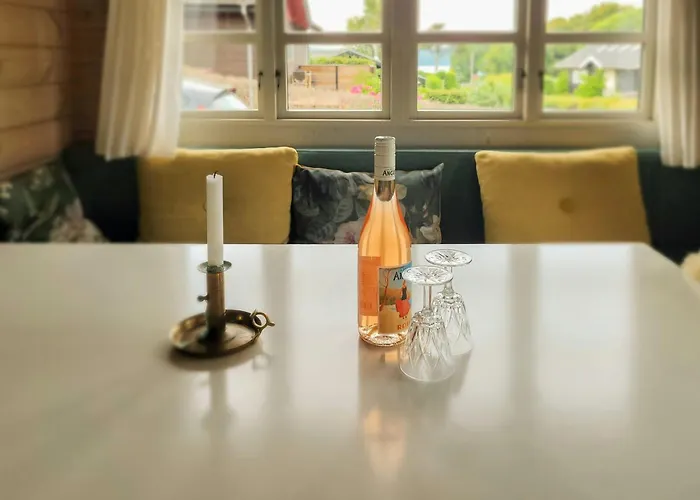 Black-painted Log House Overlooking Vejle Fjord Børkop