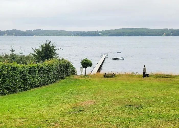 Semesterbostad Black-painted Log House Overlooking Vejle Fjord Børkop