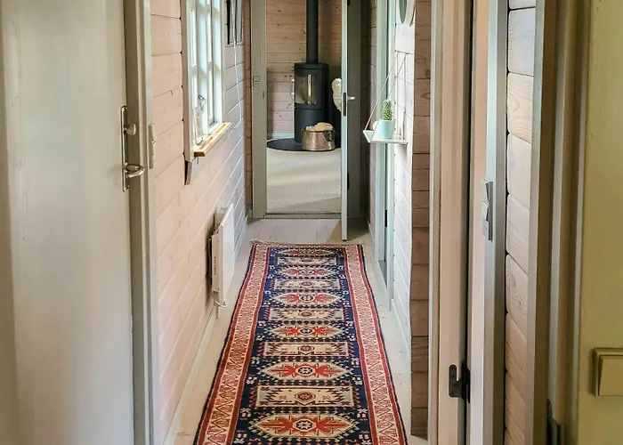 Semesterbostad Black-painted Log House Overlooking Vejle Fjord Børkop